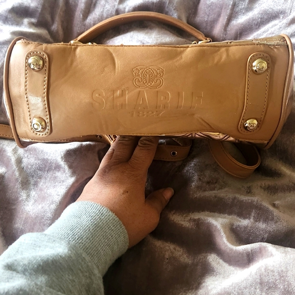 SHARIF Rose gold bag; removable strap converts from crossbody to clutch
